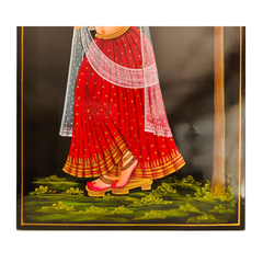 Tribal woman holding flower Nirmal painting