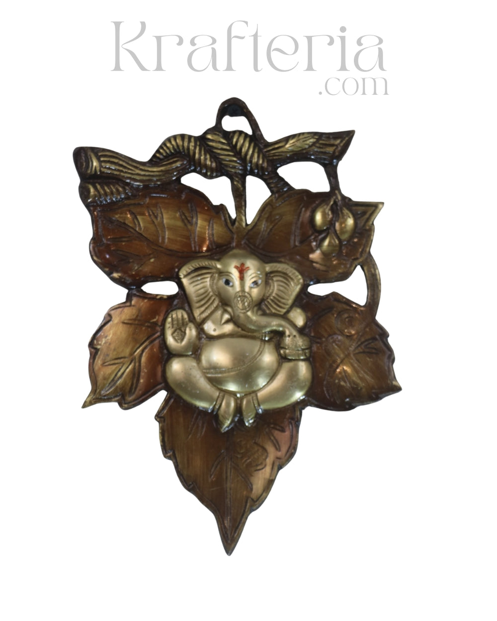 Decorative brass figure of a seated deity between leaves on a white background with 'Krafteria.com' branding.