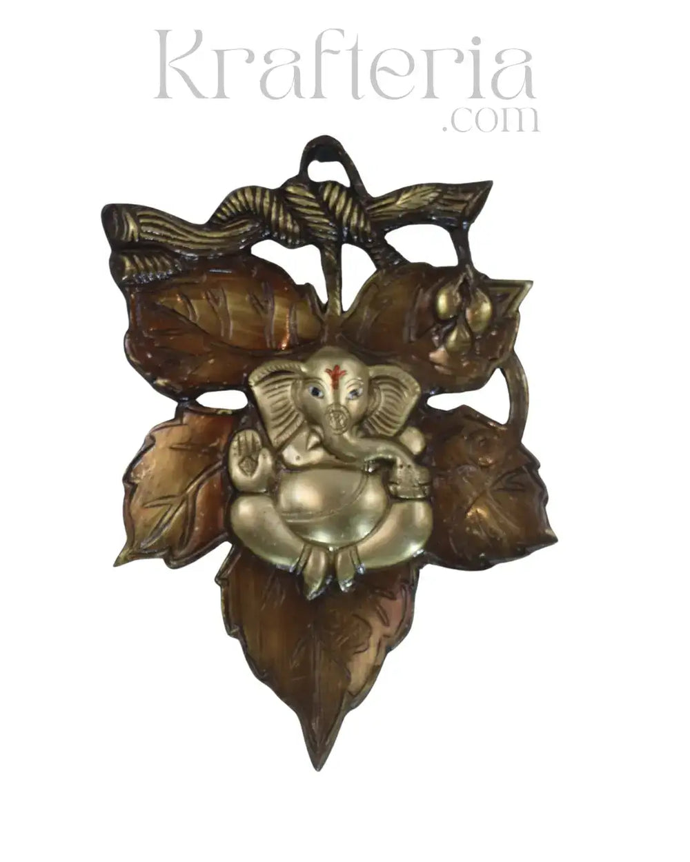 Decorative brass figure of a seated deity between leaves on a white background with 'Krafteria.com' branding.