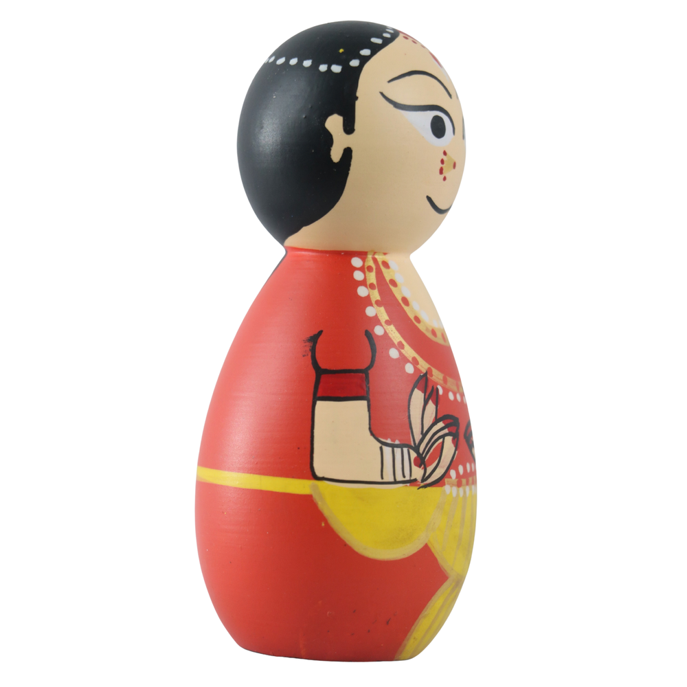 Vibrant handcrafted peg doll women