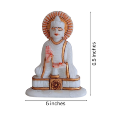 Spiritual white marble Buddha figurine with detailed gold finish.