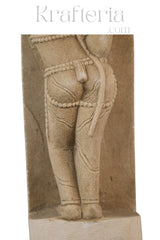 Ancient Stone Carving - A Figure Adorned Sculpture