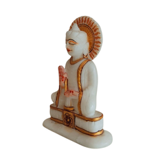 Handcrafted marble Buddha idol with gold accents for home décor.