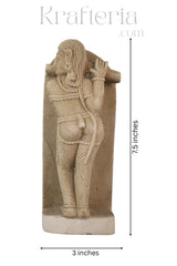 Ancient Stone Carving - A Figure Adorned Sculpture