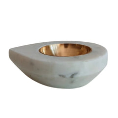 Handcrafted white marble diya oil lamp for pooja rituals.