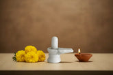 Small white marble Shiva Lingam for pooja and home temple.