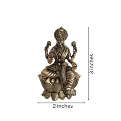 Classic Four-Armed Brass Lakshmi Idol Seated on Lotus - Symbol of Prosperity