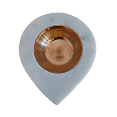 Decorative marble oil lamp for temple and home décor.