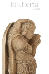 A Lady Adorning Herself with a Mirror