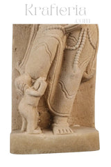 Classical Indian sandstone carving of female figure with child