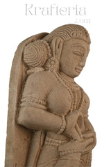 Artisan-made sandstone female figure with child traditional stone art
