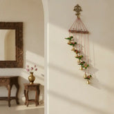 Vibrant Indian folk art parrot cascade wall hanging with colorful hand-painted wooden parrots in cascading design