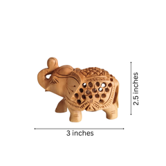 Intricately Carved Wooden Elephant Figurine with Filigree Design