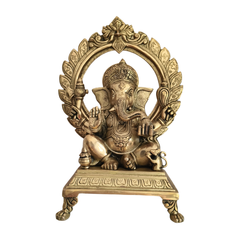 Brass Lord Ganesha Idol on Pedestal with Ornate Prabhavali Arch