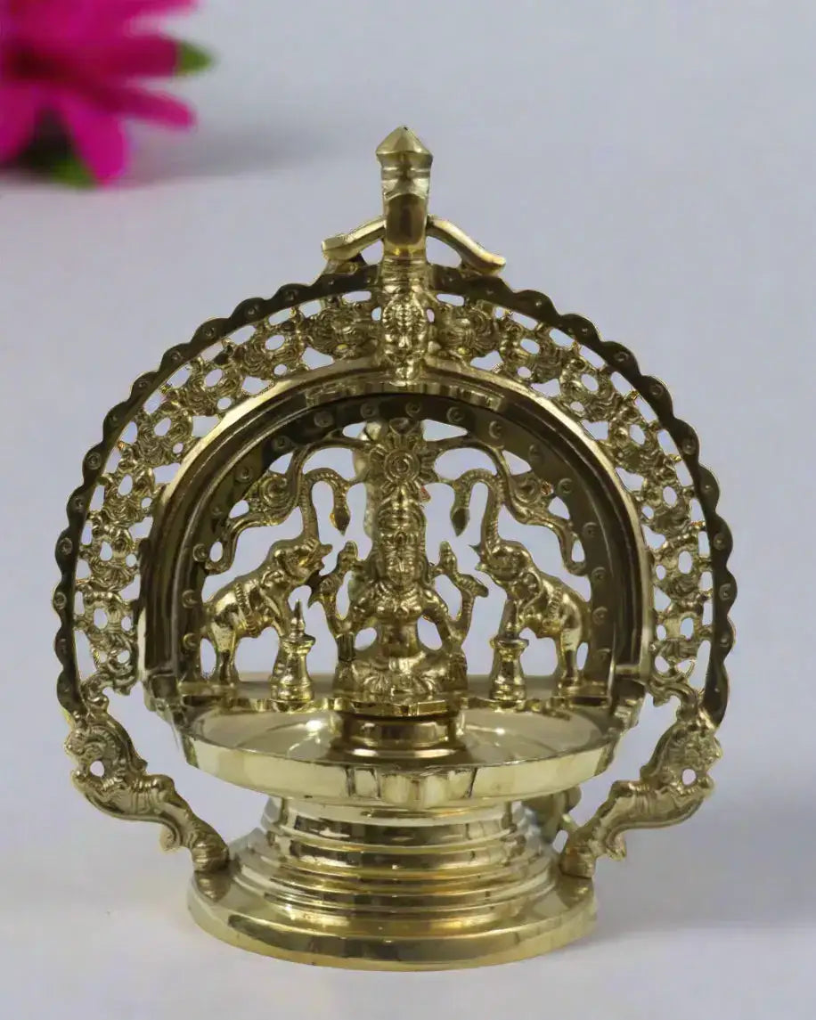 Bronze Hanging Deepam Decorative brass lamp with intricate design on a white background