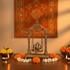 Unique Brass Lord Ganesha on Swing (Jhula): Idol of Joy, Playfulness, and Auspiciousness Brass Ware