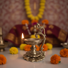 Handcrafted Brass Peacock Pedestal Diya – Traditional Tabletop Oil Lamp with Lotus Base Brass Artwork