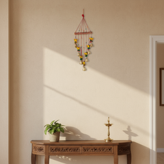 Hand-painted Lord Ganesha and golden bell wind chime wall hanging with vibrant colors and traditional Indian design