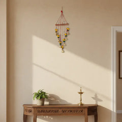 Hand-painted Lord Ganesha and golden bell wind chime wall hanging with vibrant colors and traditional Indian design
