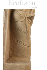 Backward Glance - A Moment Captured in Stone Sand Stone