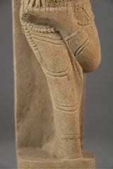 Backward Glance - A Moment Captured in Stone Sand Stone