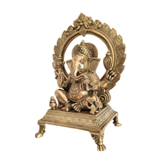Brass Lord Ganesha Idol on Pedestal with Ornate Prabhavali Arch