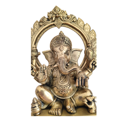 Brass Lord Ganesha Idol on Pedestal with Ornate Prabhavali Arch