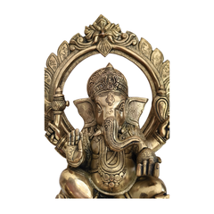 Brass Lord Ganesha Idol on Pedestal with Ornate Prabhavali Arch