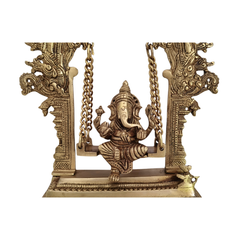Unique Brass Lord Ganesha on Swing (Jhula): Idol of Joy, Playfulness, and Auspiciousness
