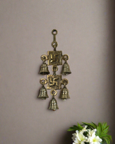 Elegant Brass Swastik Bell Wall Art with Spiritual Significance