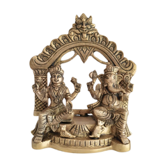 Brass Lakshmi and Ganesha Idol under Archway | Prabhavali