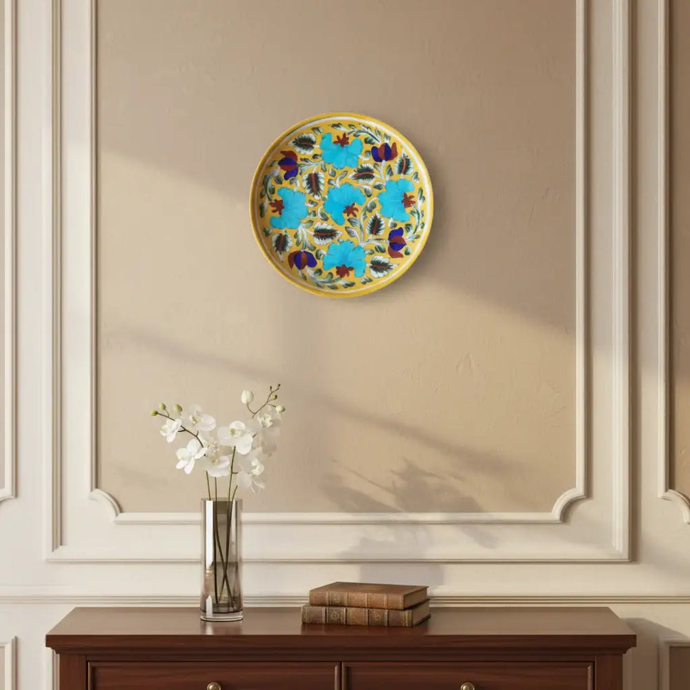 Hand-Painted Blue Floral Decorative Wall Plate on Yellow Pottery
