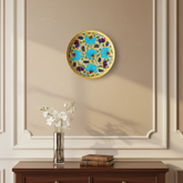 Hand-Painted Blue Floral Decorative Wall Plate on Yellow Pottery