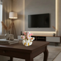 Serene White Marble-Finish Lord Ganesha Idol with Pink and Gold Accents Marble Soft Stone