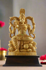 Decorative statue on a stand with 'Krafteria' branding in the background