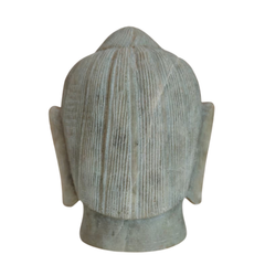 White marble Buddha face statue for meditation and home décor.