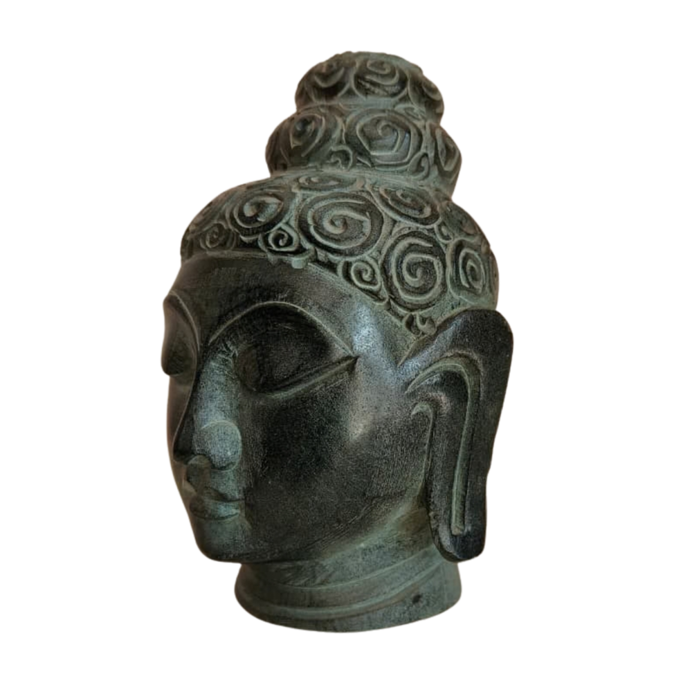 Minimalist Buddha face idol for spiritual and calming interiors.