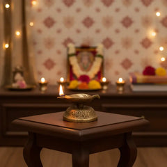 Elegant Brass Leaf-Shaped Diya with Carved Base Brass Ware