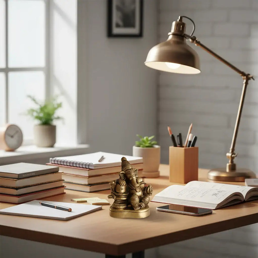 Brass idol showing Lord Shiva seated with his son, Lord Ganesha, seated near him, symbolizing the divine father-son bond.