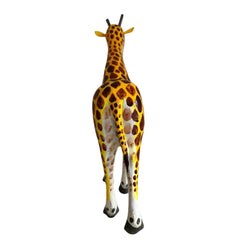 Hand-painted wooden giraffe decor inspired by Nirmal craftsmanship