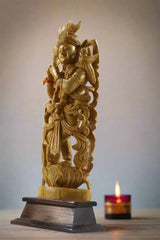 Decorative statue on a wooden base with 'Krafteria' branding.