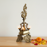 Brass Peacock Pedestal Diya – 4 Wick Traditional Standing Oil Lamp Brass Artwork