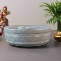 Urli Bowl in Soft Stone with Statue Holder – Artistic Puja Accent