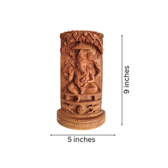 Intricate Cylindrical Wooden Carving with Ganesha and Sacred Cow Scenes
