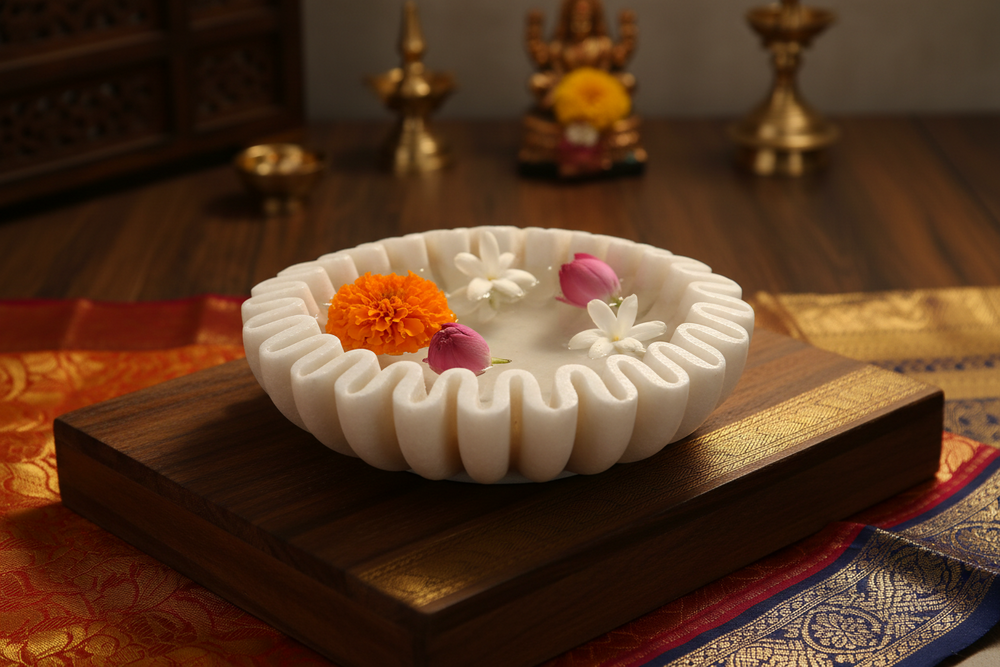 Elegant white marble decorative bowl with ruffle edge design.