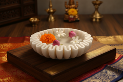 Elegant white marble decorative bowl with ruffle edge design.