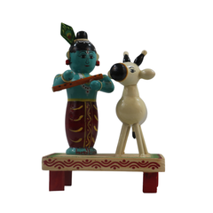 Artisan-made Chennapattnam wooden Krishna with cow religious showpiece