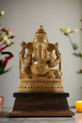Wooden statue of Ganesha on a white background with 'Krafteria.com' branding.