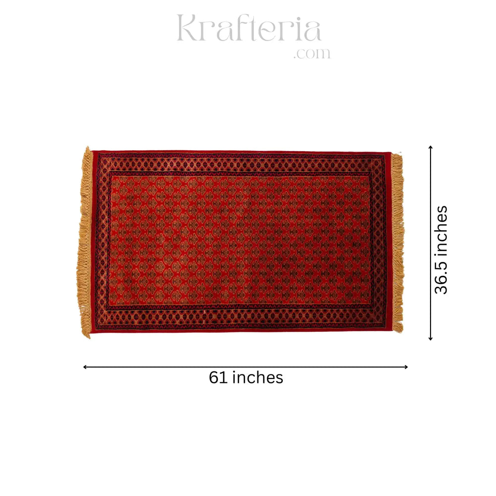 Red patterned rug with dimensions on a white background, featuring the brand 'Krafteria'.