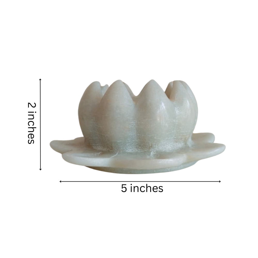 Traditional lotus flower candle holder sculpted in marble.